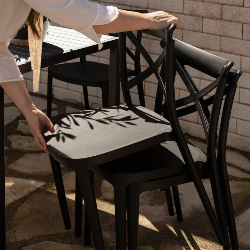 Plastic stacking garden dining chair black