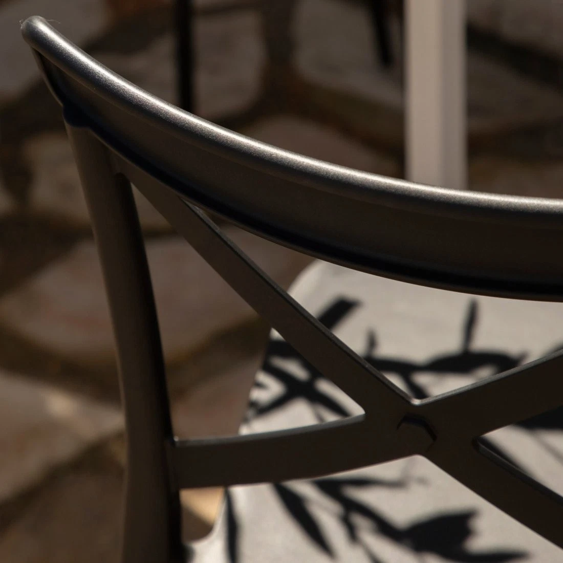 Plastic stacking garden dining chair black